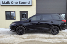 Black 2020 Mitsubishi Outlander with blackout wheels and window tint